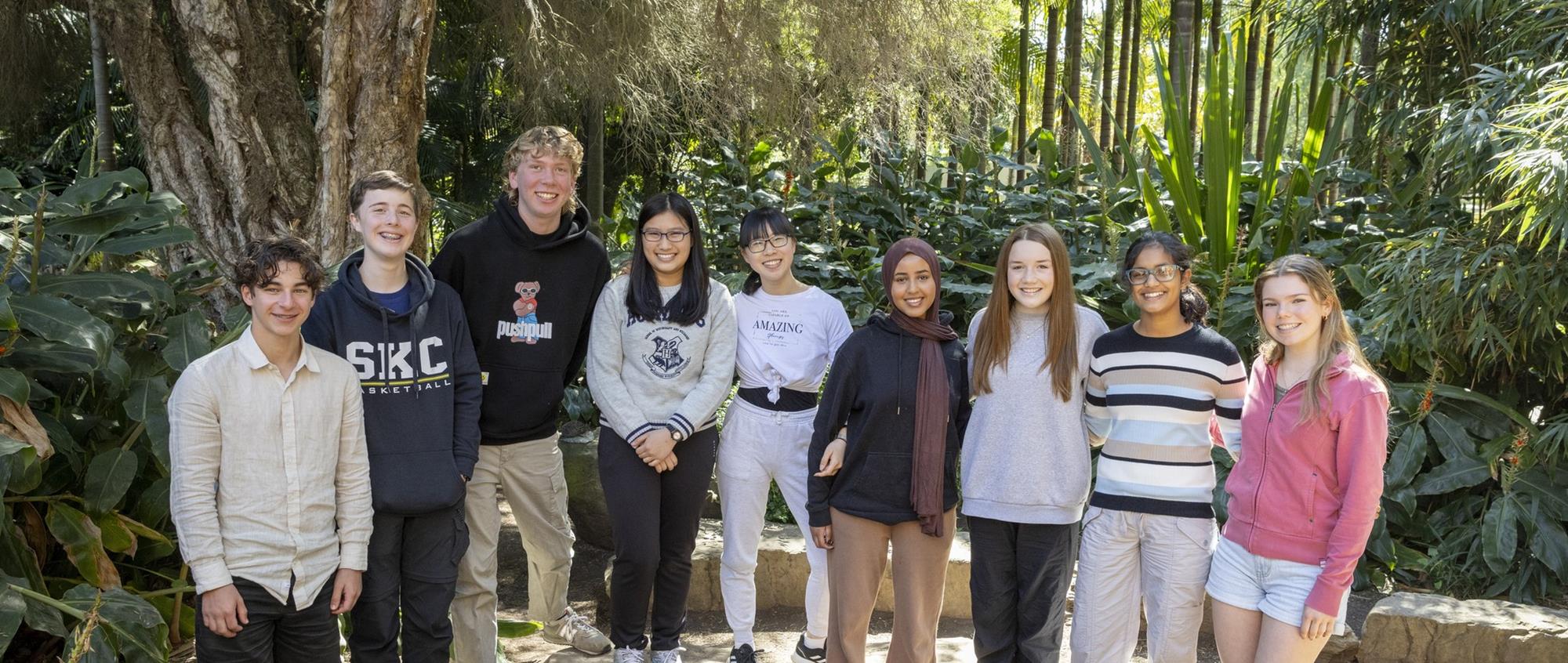 The nine members of Youth Advisory Board, happily posing together at Melbourne Zoo.